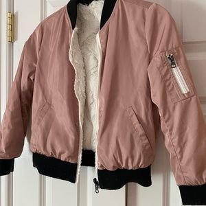 Pink fur lined coat.  Fits 6-8 years